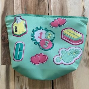 Green Cosmetic Pouch with Colorful Patches